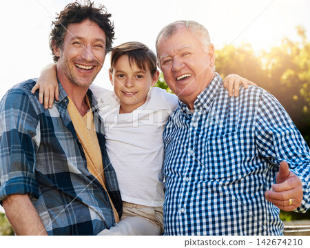 Grandfather, father and boy with portrait in outdoor park for happiness, support and bonding together. Lens flare, family and generations of men with smile for legacy, morning walk or weekend break Grandfather, father and boy with portrait in outdoor park for happiness, support and bonding together. Lens flare, family and generations of men with smile for legacy, morning walk or weekend break 142674210