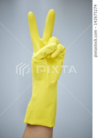 Cleaning, latex and peace sign with hand for chores or housework in studio on white background. Emoji, hospitality and person in rubber glove for hygiene, protection and safety from bacteria germs Cleaning, latex and peace sign with hand for chores or housework in studio on white background. Emoji, hospitality and person in rubber glove for hygiene, protection and safety from bacteria germs 142675274