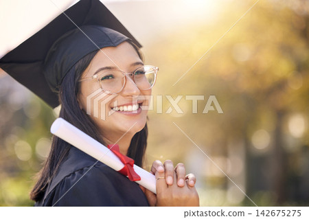 Portrait, certificate or girl with graduation, student or university with degree, achievement or celebration. Face, person or woman with education, success or college with event, scholarship or smile Portrait, certificate or girl with graduation, student or university with degree, achievement or celebration. Face, person or woman with education, success or college with event, scholarship or smile 142675275