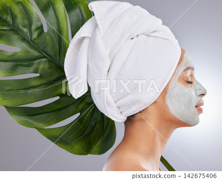 Leaf, woman and face mask for skincare, profile and facial treatment on white background. Beauty, natural or organic for female person, smile and cosmetic for dermatology detox and exfoliate product Leaf, woman and face mask for skincare, profile and facial treatment on white background. Beauty, natural or organic for female person, smile and cosmetic for dermatology detox and exfoliate product 142675406