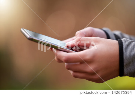 Outdoor, hands and smartphone with typing, woman and internet with social media, check progress and digital app. Person, athlete and runner in park, cellphone and mobile user with network and contact Outdoor, hands and smartphone with typing, woman and internet with social media, check progress and digital app. Person, athlete and runner in park, cellphone and mobile user with network and contact 142675594