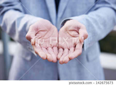Hands, empty and palm of person outdoor for offer or begging, support and asking for help or donations in desperation. Man, beggar and outside waiting for handout or blessing, poverty and charity. Hands, empty and palm of person outdoor for offer or begging, support and asking for help or donations in desperation. Man, beggar and outside waiting for handout or blessing, poverty and charity. 142675673
