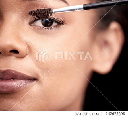 Portrait, makeup and woman with mascara brush in home for skincare, beauty or extension in bathroom. Apply cosmetics, eyelashes and face of girl with product for morning routine to prepare closeup Portrait, makeup and woman with mascara brush in home for skincare, beauty or extension in bathroom. Apply cosmetics, eyelashes and face of girl with product for morning routine to prepare closeup 142675698