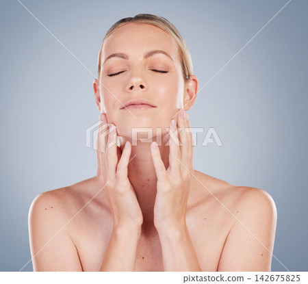 Antiaging, skincare and calm woman with beauty for healthy texture on studio background. Clean, face or model with glow on skin from dermatology facial, cosmetics and treatment with wellness or peace Antiaging, skincare and calm woman with beauty for healthy texture on studio background. Clean, face or model with glow on skin from dermatology facial, cosmetics and treatment with wellness or peace 142675825