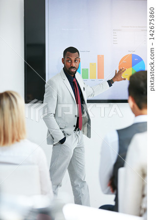 Businessman, coach and chart with screen for presentation, meeting or corporate statistics at seminar. Black man, manager or speaker talking to group of employees on company revenue, growth or profit Businessman, coach and chart with screen for presentation, meeting or corporate statistics at seminar. Black man, manager or speaker talking to group of employees on company revenue, growth or profit 142675860