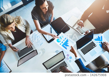 Laptop, paperwork and business people coworking with charts, graphs and statistics for productivity growth. Data analysis, men and women with computer for development, planning and office from above 142675908