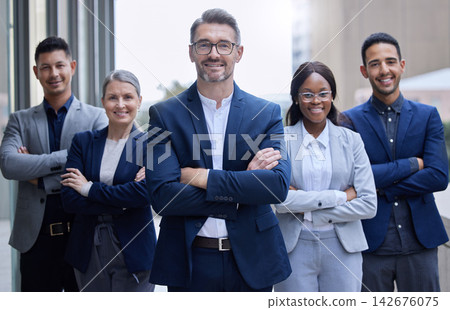 Business people, portrait and group outdoor in city for corporate work as legal advisors or attorneys for real estate. Team, serious and confident with arms crossed for management strategy and leader Business people, portrait and group outdoor in city for corporate work as legal advisors or attorneys for real estate. Team, serious and confident with arms crossed for management strategy and leader 142676075
