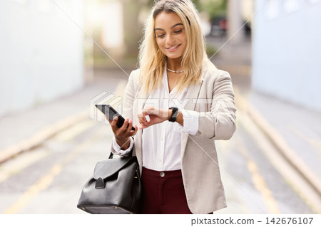 Woman, outside and business and watch time, busy and planning schedule with smartphone for appointment. Professional and urban city or down town, monitoring and checking for morning travel on app 142676107