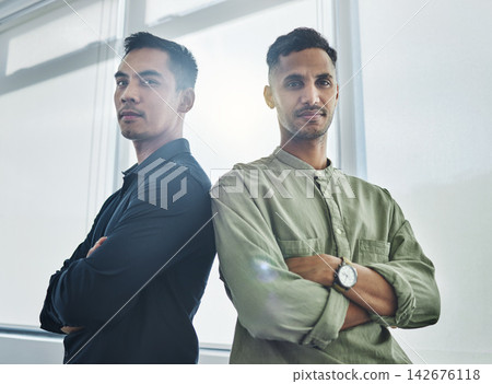 Confident, men and portrait in office for success, management and serious in workplace. Crossed arms, startup and partners in company for ambition, teamwork or together with pride for achievement Confident, men and portrait in office for success, management and serious in workplace. Crossed arms, startup and partners in company for ambition, teamwork or together with pride for achievement 142676118