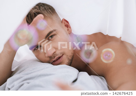 Morning, portrait or topless man with pillow in bedroom for resting in home, house or apartment to relax. Wake up, lens flare or guy sleeping on break with peace, bedding or wellness on weekend chill Morning, portrait or topless man with pillow in bedroom for resting in home, house or apartment to relax. Wake up, lens flare or guy sleeping on break with peace, bedding or wellness on weekend chill 142676425