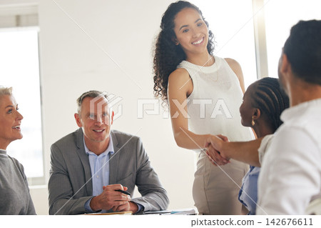 Business, people and handshake in meeting for welcome greeting to corporate career, job and recruitment or hiring. Man, woman and shaking hands for b2b partnership deal, proposal and work agreement. Business, people and handshake in meeting for welcome greeting to corporate career, job and recruitment or hiring. Man, woman and shaking hands for b2b partnership deal, proposal and work agreement. 142676611