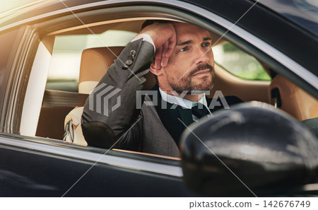 Businessman, professional and thinking or driving in car for commute to corporate work or job as entrepreneur of company. Man, motor vehicle and daily journey with transportation, smile and travel. Businessman, professional and thinking or driving in car for commute to corporate work or job as entrepreneur of company. Man, motor vehicle and daily journey with transportation, smile and travel. 142676749