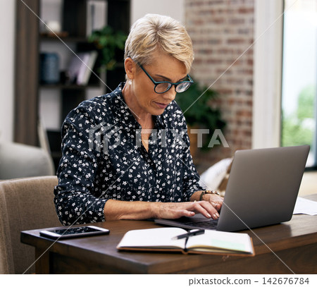 Typing, laptop and mature woman in office with corporate company communication email online. Technology, notes and female hr manager working on computer for business dispute on internet in workplace. Typing, laptop and mature woman in office with corporate company communication email online. Technology, notes and female hr manager working on computer for business dispute on internet in workplace. 142676784