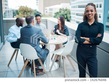 Portrait, female person and happy on balcony in arms crossed or pride as lawyer in company with colleagues or coworkers. Woman, attorney and smile in outdoor for meeting, networking or brainstorming Portrait, female person and happy on balcony in arms crossed or pride as lawyer in company with colleagues or coworkers. Woman, attorney and smile in outdoor for meeting, networking or brainstorming 142676846