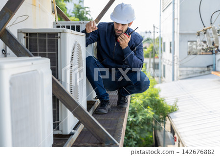 Air conditioner repairman, technician checking air conditioner, Air conditioner repairman, technician checking air conditioner, 142676882