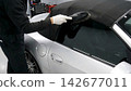 Cleaning and brushing of convertible soft tops 142677011