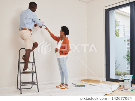Interior design, color swatch and couple for renovation, house improvement and nursery with pregnant woman. Husband, hand gesture and decision on painting wall, diy and planning or expecting parents 142677094