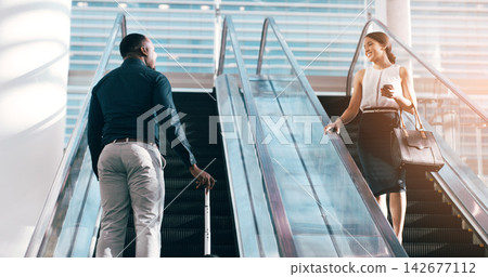 Business people, greeting and escalator with luggage at airport for work trip, travel or opportunity. Happy businessman and woman talking on electric staircase or lift for immigration with bags Business people, greeting and escalator with luggage at airport for work trip, travel or opportunity. Happy businessman and woman talking on electric staircase or lift for immigration with bags 142677112