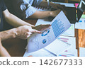 Business Meeting with graph, Growth Analysis, Charts on paper statistics data finance business Presentation to the teamwork 142677333