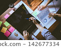 communication online meeting team of employees discussing financial statistics. top view. 142677334