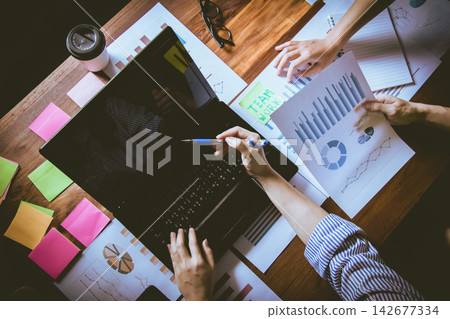communication online meeting team of employees discussing financial statistics. top view. communication online meeting team of employees discussing financial statistics. top view. 142677334