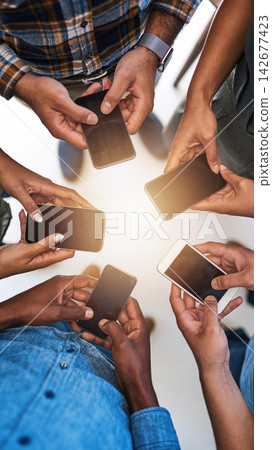 Cellphone, hands and team of people in circle networking online for email, social media or internet. Technology, typing and group of friends with phone for text message on website from above. Cellphone, hands and team of people in circle networking online for email, social media or internet. Technology, typing and group of friends with phone for text message on website from above. 142677423