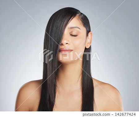 Hair care, woman and shine with beauty, glow and grooming routine on white studio background. Person, model and girl with health, dermatology or texture with shampoo, keratin and treatment on volume Hair care, woman and shine with beauty, glow and grooming routine on white studio background. Person, model and girl with health, dermatology or texture with shampoo, keratin and treatment on volume 142677424