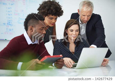 Business people, laptop and financial meeting with teamwork, collaboration and talking with audit. Online research, discussion and accounting staff with planning and working on project together Business people, laptop and financial meeting with teamwork, collaboration and talking with audit. Online research, discussion and accounting staff with planning and working on project together 142677429