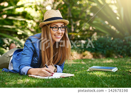 Park, thinking and girl lying with diary to journal emotion, thoughts and experience outdoor. Nature, female writer and book for self reflection on grass, knowledge and memory of woman on paper Park, thinking and girl lying with diary to journal emotion, thoughts and experience outdoor. Nature, female writer and book for self reflection on grass, knowledge and memory of woman on paper 142678198
