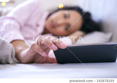 Woman, smartphone and morning text in bedroom for communication, message and social media. Female person, mobile tech and head on pillow for reading, watching and lazy weekend feeling at home Woman, smartphone and morning text in bedroom for communication, message and social media. Female person, mobile tech and head on pillow for reading, watching and lazy weekend feeling at home 142678203