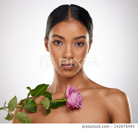 Rose, skincare and beauty portrait of woman in studio for glow, shine or health isolated on white background. Natural flower, face makeup and organic cosmetics for dermatology, wellness or serious Rose, skincare and beauty portrait of woman in studio for glow, shine or health isolated on white background. Natural flower, face makeup and organic cosmetics for dermatology, wellness or serious 142678495