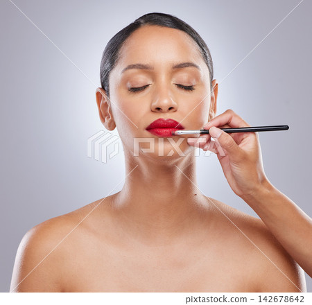 Woman, lipstick and studio with product, hand and cosmetic makeup for beauty. Cosmetology, face or skincare for facial treatment with tool, artist or lip application with shine for female person Woman, lipstick and studio with product, hand and cosmetic makeup for beauty. Cosmetology, face or skincare for facial treatment with tool, artist or lip application with shine for female person 142678642