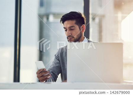 Businessman, working or phone in office with laptop for law, research for court or agreement. Male lawyer or workplace with computer and mobile for email, review for client with dispute in contract 142679000