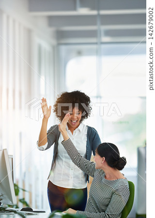 Computer, collaboration and high five for success with business people in office for bonus or support. Deal, smile and winner with employee team in workplace for celebration of goals or target 142679002
