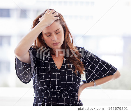 Business woman, stress and management with burnout or sad, hands and task in office. Anxiety, headache and pressure for employee for paperwork, deadline and review or frustrated for company. Business woman, stress and management with burnout or sad, hands and task in office. Anxiety, headache and pressure for employee for paperwork, deadline and review or frustrated for company. 142679291