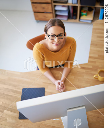 Above, woman and computer in office with project in creative workplace for web developer or coding. Happy, person and development of company website, app or programmer at desktop for productivity Above, woman and computer in office with project in creative workplace for web developer or coding. Happy, person and development of company website, app or programmer at desktop for productivity 142679908