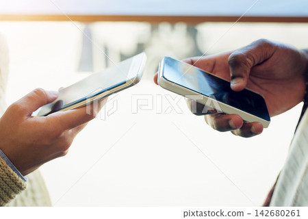 Hands, friends and cellphone with typing, connection and sunshine with internet, social media and communication. Closeup, share or people with smartphone, mobile user and digital app for website 142680261