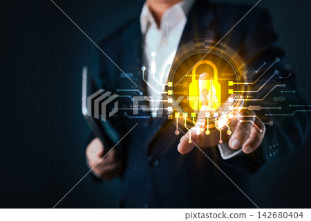 Businessman touching virtual padlock interface. Cybersecurity concept for digital data privacy protection, secure internet network technology and online information safety system. Businessman touching virtual padlock interface. Cybersecurity concept for digital data privacy protection, secure internet network technology and online information safety system. 142680404