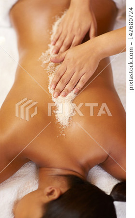 Salt scrub, massage and spa with woman, hands and skincare with stress relief, peaceful and holiday. Masseuse, person or girl with vacation, body luxury and treatment to exfoliate, relax or beauty Salt scrub, massage and spa with woman, hands and skincare with stress relief, peaceful and holiday. Masseuse, person or girl with vacation, body luxury and treatment to exfoliate, relax or beauty 142680724