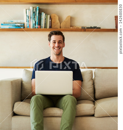 Sofa, smile and man with laptop in portrait at home for online network, communication and research. Happy, remote work and male person with technology for freelance website, information or connection Sofa, smile and man with laptop in portrait at home for online network, communication and research. Happy, remote work and male person with technology for freelance website, information or connection 142680830
