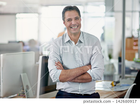 Portrait, smile and businessman with arms crossed, office and confident in corporate company manager and workplace. Happy, professional and sales with male person and expert employee in agency Portrait, smile and businessman with arms crossed, office and confident in corporate company manager and workplace. Happy, professional and sales with male person and expert employee in agency 142680917