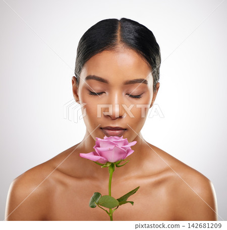 Smell rose, beauty and woman in studio for skincare glow, shine and health isolated on white background. Scent, natural flower, and model in organic cosmetics for dermatology, wellness and makeup 142681209