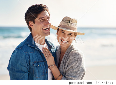 Couple hug, portrait and smile at beach for sunshine, holiday romance, love together and honeymoon. Happy woman, man and face by ocean for summer vacation, peace and marriage with trust in Argentina Couple hug, portrait and smile at beach for sunshine, holiday romance, love together and honeymoon. Happy woman, man and face by ocean for summer vacation, peace and marriage with trust in Argentina 142681844