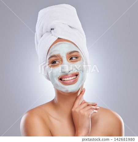 Studio, woman and face mask for skincare, cosmetic and facial treatment on white background. Beauty, towel or smile for female person, cream and dermatology for detox and anti aging exfoliate product Studio, woman and face mask for skincare, cosmetic and facial treatment on white background. Beauty, towel or smile for female person, cream and dermatology for detox and anti aging exfoliate product 142681980