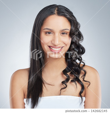 Hair, beauty and portrait of woman with studio before and after, shampoo or hairstyle, comparison or results on grey background. Haircare, different or cosmetic, choice or beach waves vs straight Hair, beauty and portrait of woman with studio before and after, shampoo or hairstyle, comparison or results on grey background. Haircare, different or cosmetic, choice or beach waves vs straight 142682145