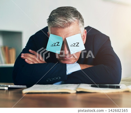 Sleeping, sticky notes and eyes of business man with tired, burnout and fatigue of a mature professional in office. Paper, mental health and entrepreneur with nap and corporate break at a company Sleeping, sticky notes and eyes of business man with tired, burnout and fatigue of a mature professional in office. Paper, mental health and entrepreneur with nap and corporate break at a company 142682165