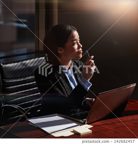 Lawyer, woman and laptop with thinking in office for case administration, choice and review information for court. Person, attorney or advocate by computer, notes and documents at commercial law firm Lawyer, woman and laptop with thinking in office for case administration, choice and review information for court. Person, attorney or advocate by computer, notes and documents at commercial law firm 142682457