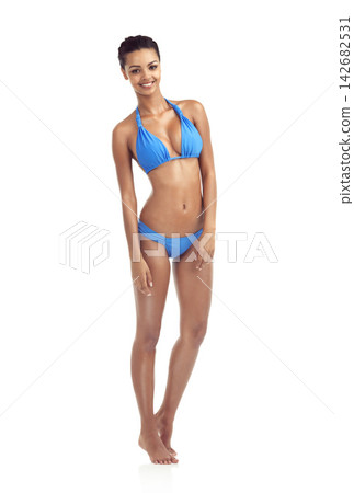 Summer, bikini and portrait of woman on a white background for style, fashion and swimwear. Happy, studio and body of girl in swimsuit with confidence for holiday, tropical beach and vacation Summer, bikini and portrait of woman on a white background for style, fashion and swimwear. Happy, studio and body of girl in swimsuit with confidence for holiday, tropical beach and vacation 142682531
