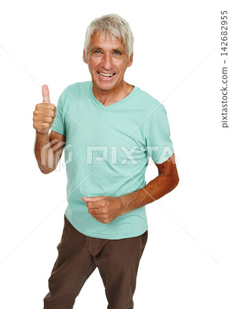 Happy, portrait and senior man with thumbs up support in studio for feedback, vote or opinion on white background. Smile, face and elderly male model with hand emoji for winner, success or promotion 142682955