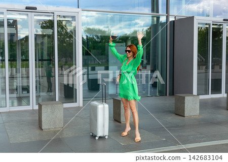 Airport Terminal Beautiful woman Wait for Vacation Flight 142683104
